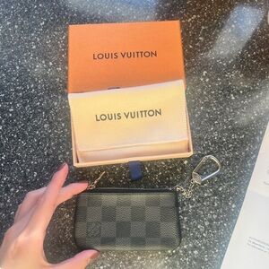 Authentic black monogram, Louis Vuitton pouch